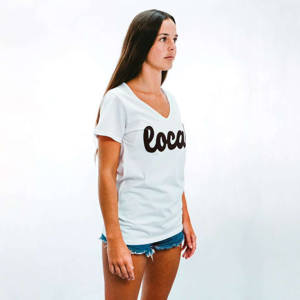 Model shot wearing Womens White 100% cotton T-shirt with Local logo in Black